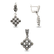 Orient 2er Set aus 925 Silber mit Markasit, bestehend aus Anhänger und Ohrringen im floralen Design.