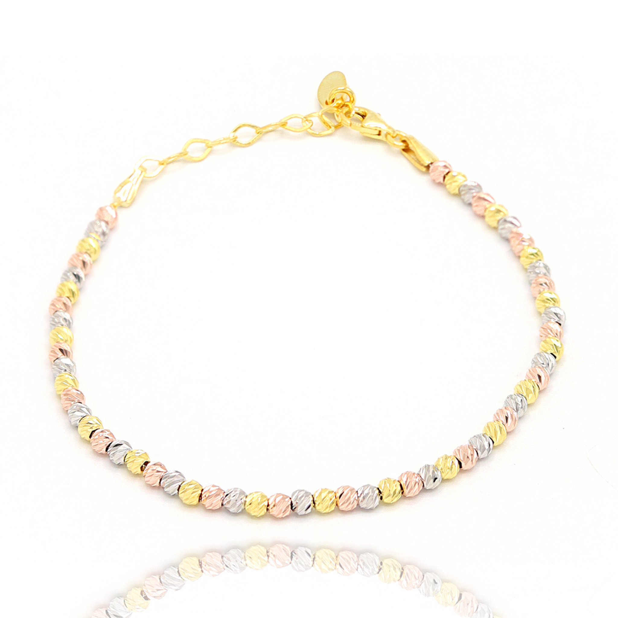 Tricolor Armband aus 925 Silber mit facettierten Kugeln in Gold, Roségold und Silber, filigranes Design am Handgelenk